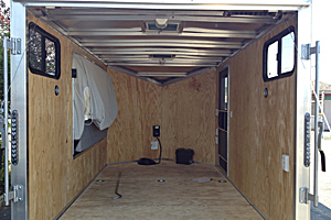 Interior view of trailer w/110v, bunk, windows, 12v battery system